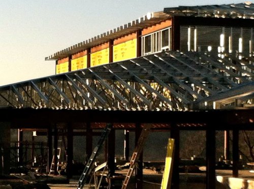 Exterior Drywall Begins Covering Clearstory