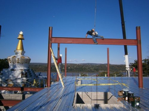 First Upper Level Beam In Place
